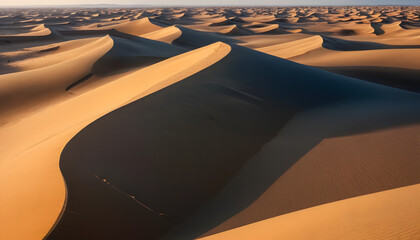 Fototapeta premium Experience the breathtaking beauty of endless golden dunes in this high-resolution desert landscape. Perfect for travel, nature, and adventure-themed projects