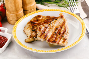 Grilled pork steak with sauce