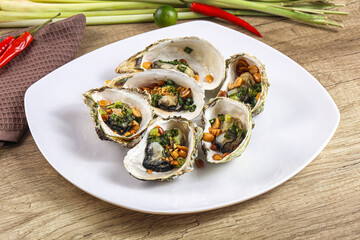 Baked oysters with green onion