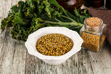 Mustard sauce with seeds in the bowl