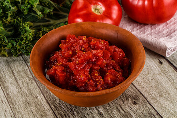 Diced ripe tomato with sauce