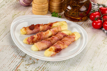 Hot mozzarella sticks with bacon