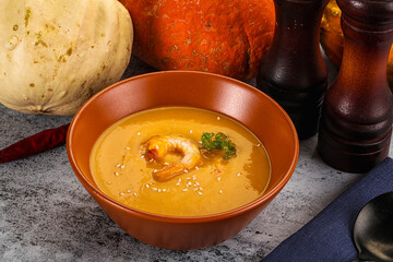 Pumpkin cream soup with prawns