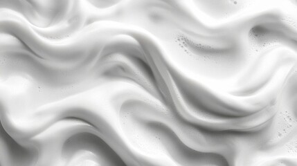 Fototapeta premium Creamy white foam swirls creating a soft rippled texture