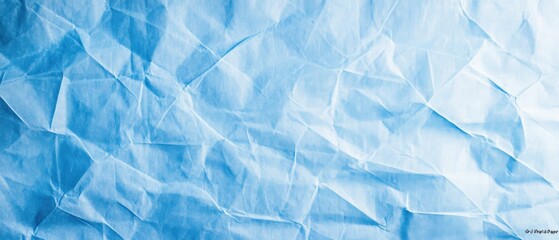 Obraz premium Blue wrinkled paper background texture