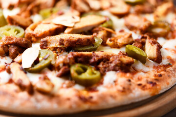 Gyros Pizza with jalapeno pepper and mozzarella cheese. Soft focus. Close up.	