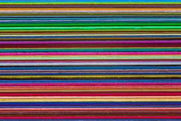 multicolor background: close up of stack of paper sheets for design