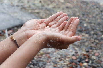 Hands Catching Raindrops