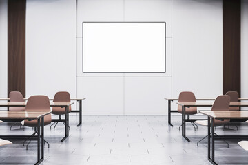Modern classroom interior with blank whiteboard on wall and empty desks arranged in rows under clean lighting in a corporate training room. 3D Rendering