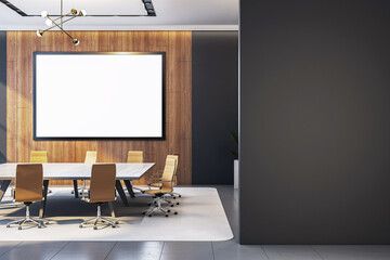 Modern corporate office meeting room with large blank display screen on wooden wall and stylish furniture under ceiling lights. 3D Rendering