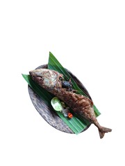 fried fish on wooden plate