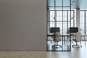 Modern office interior with empty workspace, large windows, and blank wall for mockup. 3D Rendering