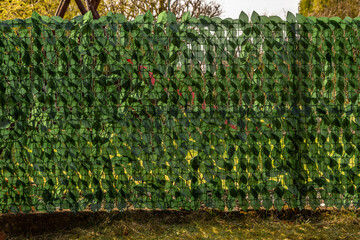 Netting made of artificial decorative leaves, protection against voyeurs
