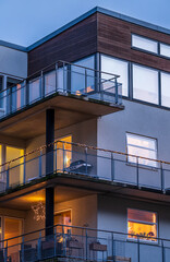 modern apartment balconies at dusk.