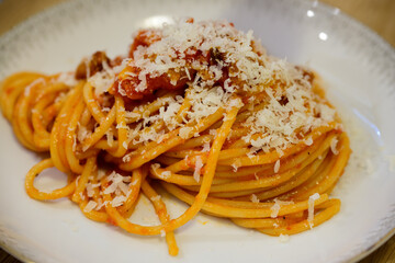 Spaghetti Amatriciana Italian or Roman Pasta with Noodles, Tomato Sauce, Guanciale and Pecorino Romano Cheese
