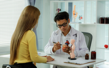 A female doctor who advises patients on heart health, disease prevention, and treatment, including...