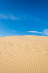 Tottori Sand Dunes – Beautiful Sand Ripples and Human Footprints Against the Blue Sky, Tottori, Japan