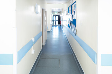 Shallow focus of the corner walls of a typical BNHS hospital corridor. Various medical and staff...