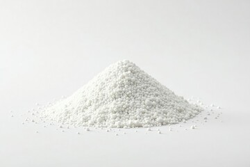 Pile of white granulated sugar on white background, dessert ingredient, confectionery
