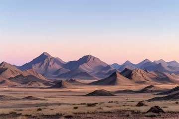 Photo sur Plexiglas Pink and Purple Desert Sunset Over Brown Mountains