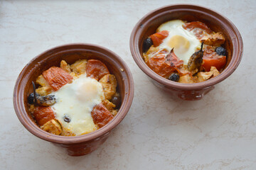 Closeup of the traditional Bulgarian dish Guveche or Shopski Style White Cheese