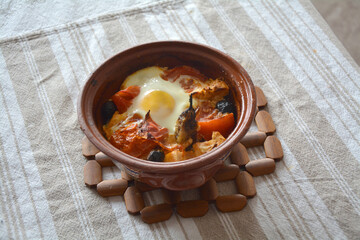 Closeup of the traditional Bulgarian dish Guveche or Shopski Style White Cheese