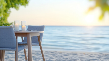 Obraz premium tranquil beach scene with a table set for two, candles glowing, against a backdrop of the sea at sunset. romance and relaxation are in the air.