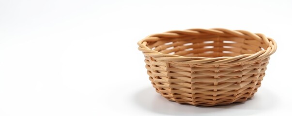 Close-up of a woven basket with no items inside on white background, natural, storage, rattan