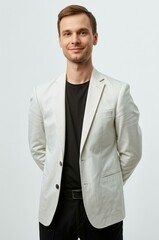 Young Caucasian Businessman Modern Minimalist Blazer Light Gray Background - Professional Portrait Corporate Branding Success Concept