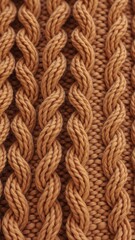 Fototapeta premium Close-up View of Brown Knitted Fabric with Textured Patterns and Warmth Perfect for Cozy Fashion or Home Decor Themes