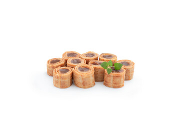Wafer rolls with condensed milk isolated on white