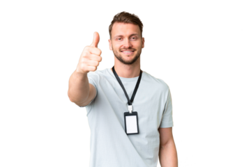 Young caucasian man with ID card over isolated chroma key background with thumbs up because something good has happened