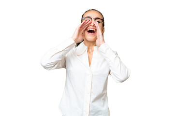 Young Arabian woman over isolated chroma key background shouting and announcing something