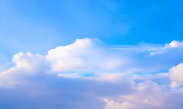 Abstract background of blue sky with fluffy white clouds, with a dreamy and soft focus effect.