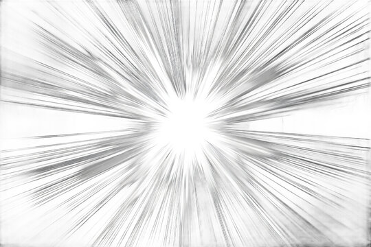 A bright white light emitting radiating beams on a black background creating a starburst effect