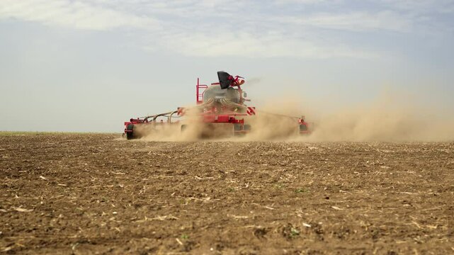 Wide Angle of Modern Tractor Towing Precision Air Seeder Sowing Crops