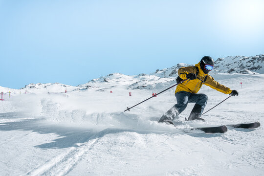 skiing in the mountains