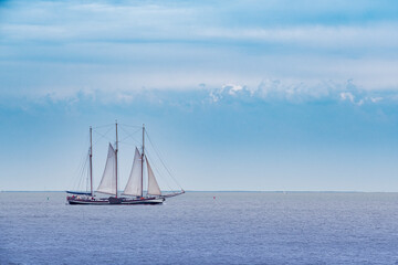 Fototapeta premium A sailing ship on the Markermeer sails towards the port of Volendam NL