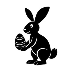 Easter bunny holding an egg silhouette