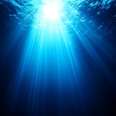 Obraz premium Sunlight filtering through clear ocean water with beams of light