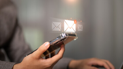 Businessman checking electronic mail ,Digital communication with email messages ,Sending and...