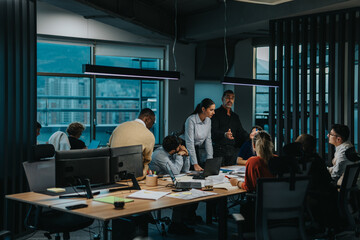 A diverse group of business people engage in a collaborative meeting in a contemporary office...