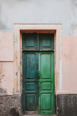 Weathered Green Door with Vintage Charm