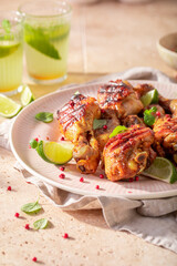 Crispy roasted chicken leg with spices and herbs.