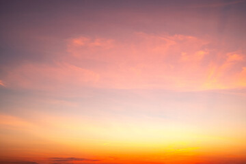 Sky,sunset, beautiful , luxury soft gradient orange gold clouds and sunlight on the blue sky perfect for the background, Sunrise on morning or evening in winter warm time ,Twilight summer,silhouette