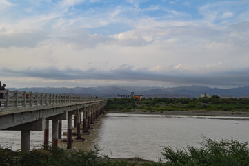 bridge over the river Baluchistan city Turbat nature clouds
