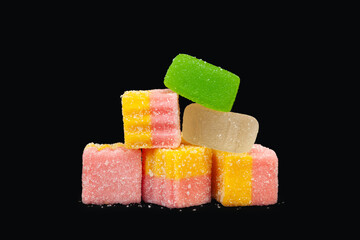 Multicolored marmalade. Jelly candies on a black. Sweets for all