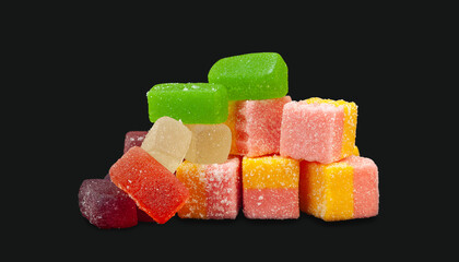 Multicolored marmalade. Jelly candies isolated on black. Sweets for everyone