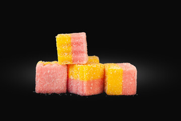 Marmalade isolated on black. Multicolored jelly candies. Sweets for everyone