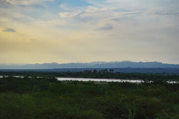 sunset over the river, clouds colorful sky nature background